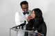 Andrew Anthony, the father of Karmelo Anthony, a 17-year-old who has been charged with first-degree murder in the fatal stabbing of fellow 17-year-old Austin Metcalf at a Frisco track meet, wipes the tears of his wife Kala Hayes as she speaks at a press conference, Thursday, April 17, 2025, at a co-working space in Dallas, Texas.