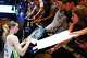 Dallas Wings guard Paige Bueckers (5) signs autographs for fans after a WNBA basketball game at College Park Center against the Phoenix Mercury, Thursday, Sept. 11, 2025, in Arlington. The Wings defeated the Mercury 97-76.