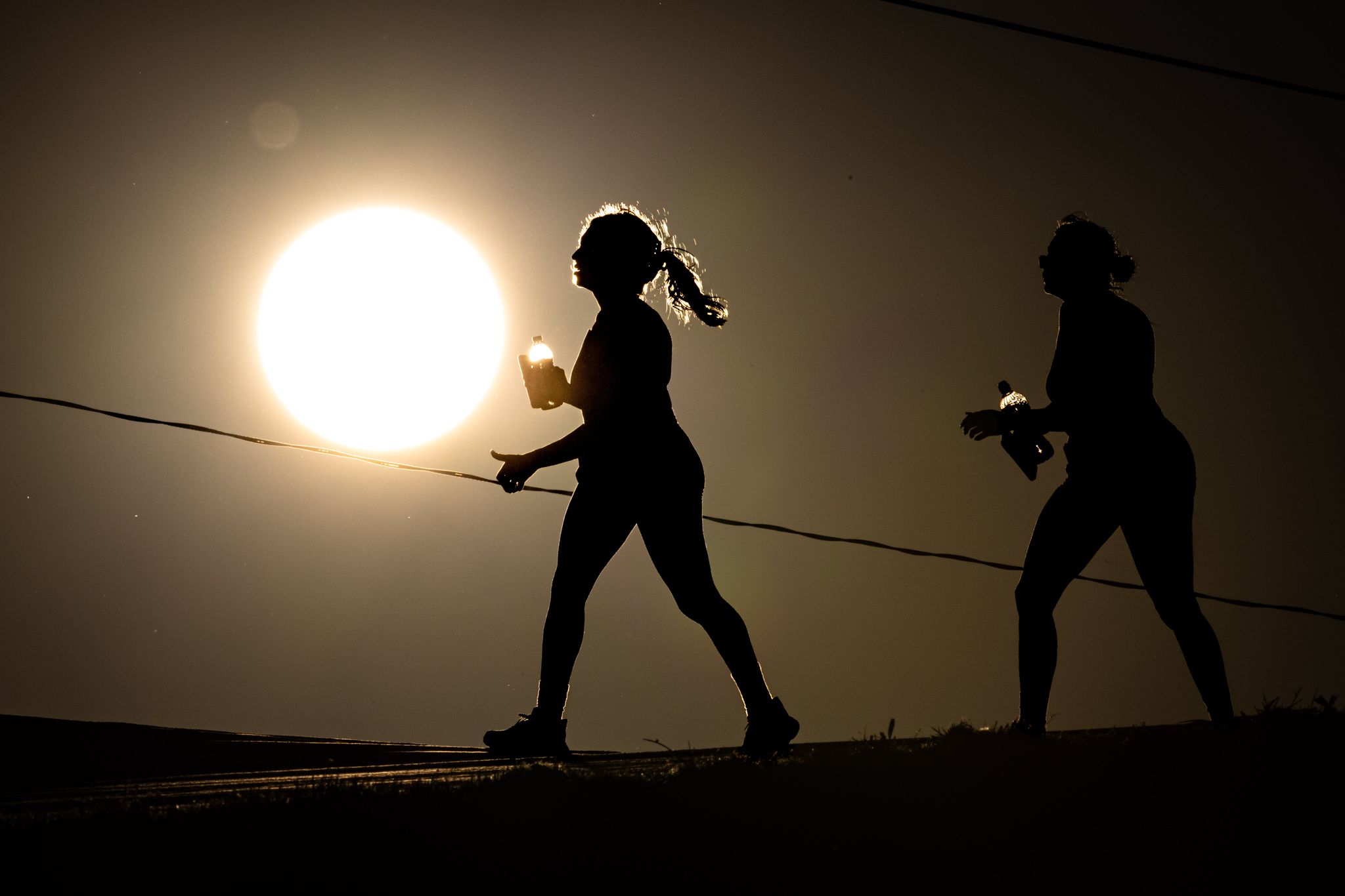 What's led to Dallas's less intense summer heat?