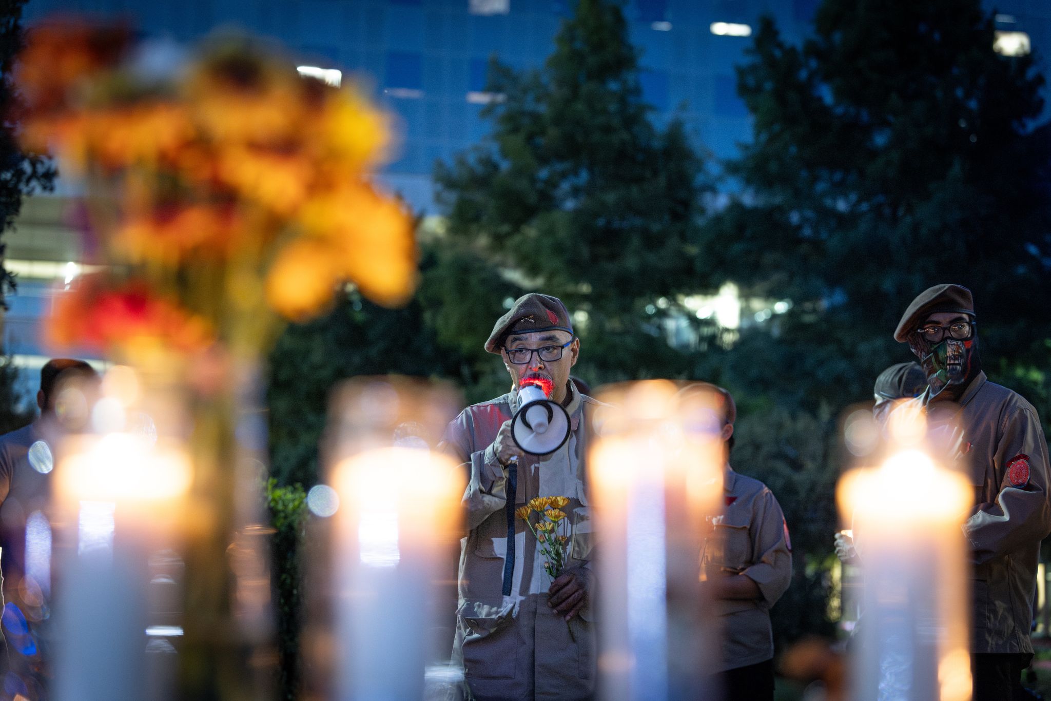 Photos: Mourners attend vigil for ICE facility shooting victims