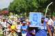 A man holds a sign with Opal Lee’s image as he participates in Opal’s Walk for Freedom on June 19, 2025 in Fort Worth. A reader writes about learning about Juneteenth.