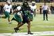 North Texas quarterback Chris Jimerson Jr. (12) threw a pass during the second half of a game against South Florida at DATCU Stadium in October 2025.