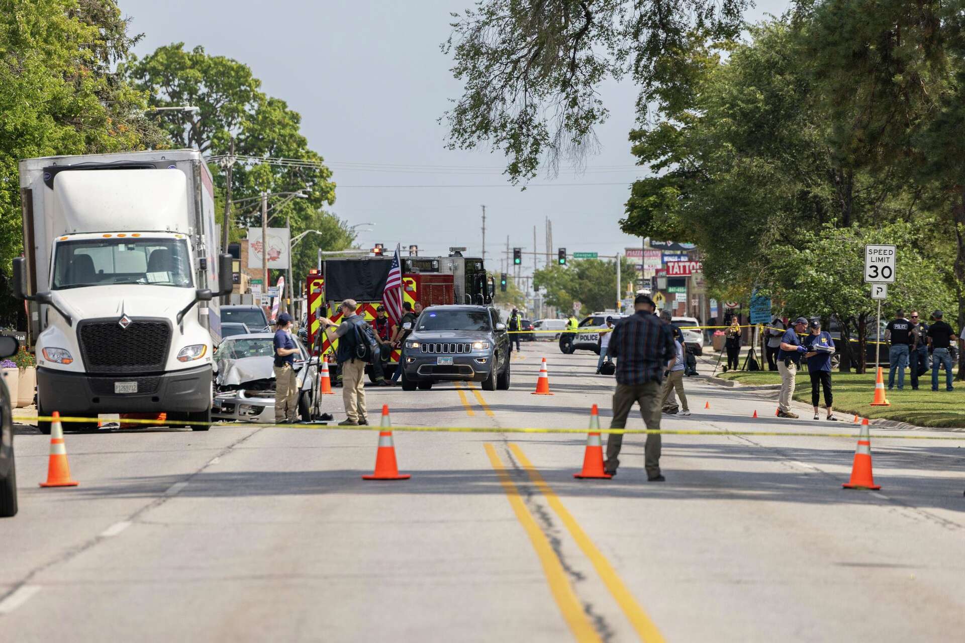 ICE officer fatally shoots suspect near Chicago, officials say