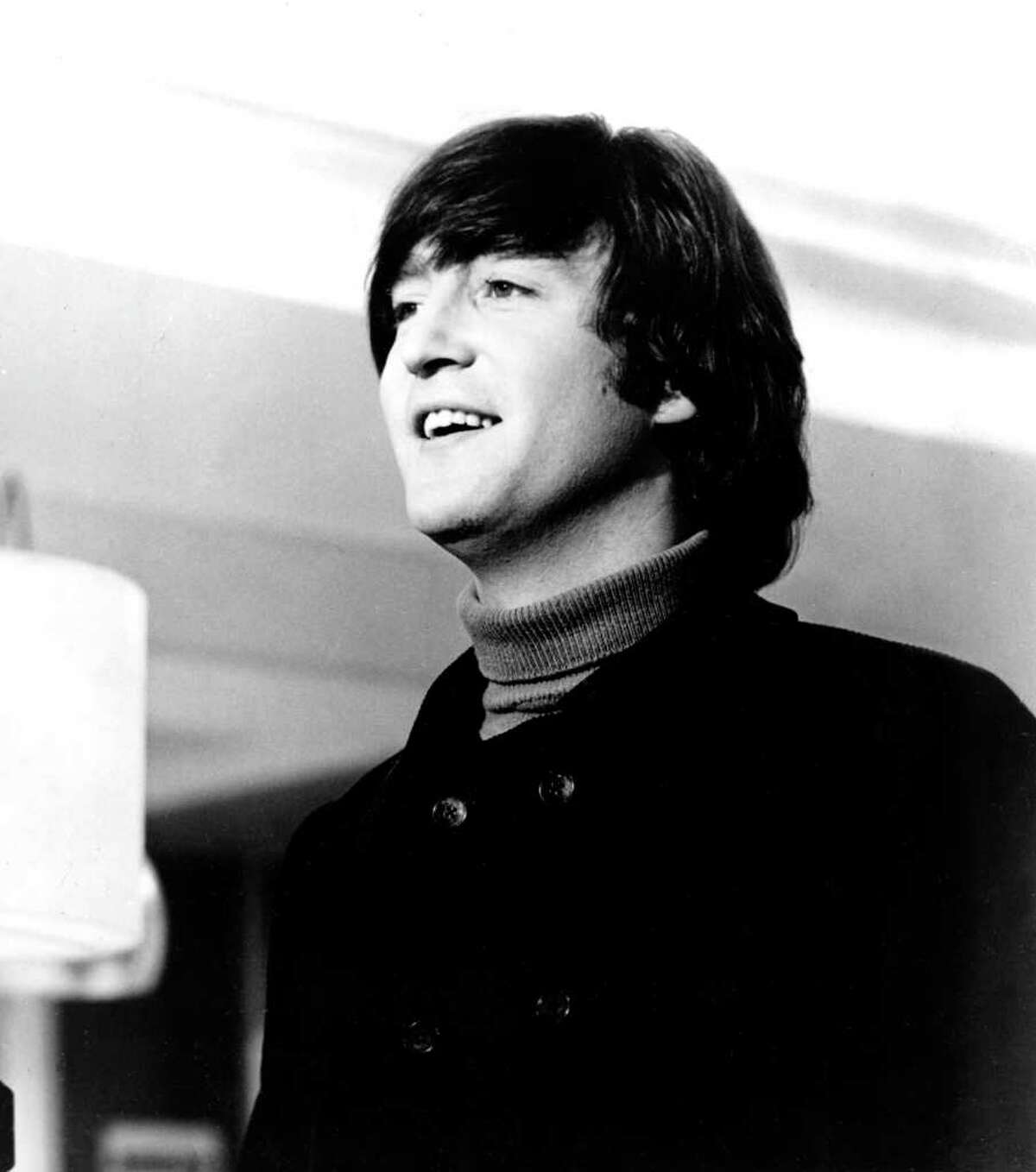 Beatle John Lennon is shown in this 1965 photo at an unknown location. (AP Photo)