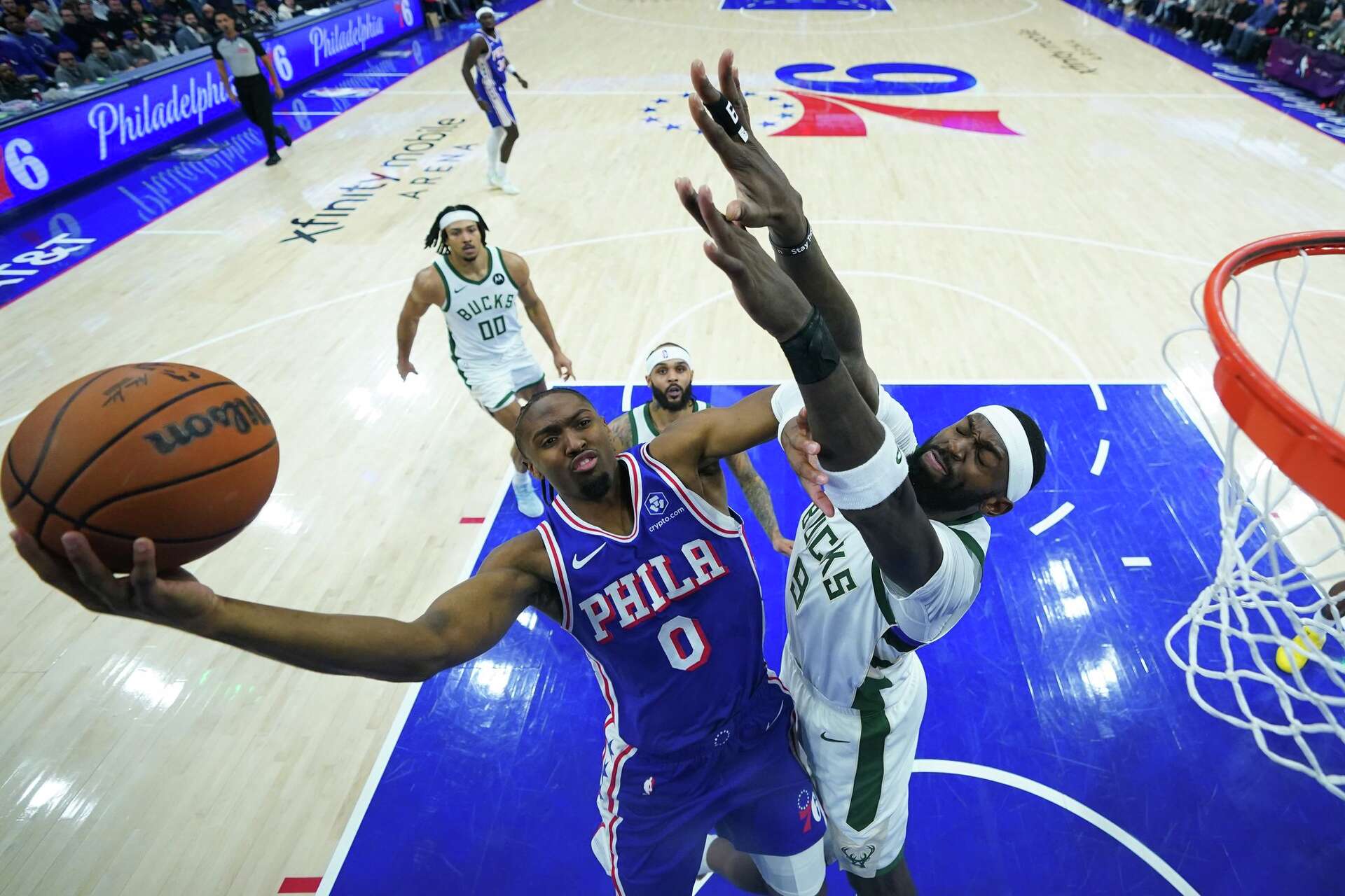 George scores 32 and Embiid has 29 to lead 76ers past short-handed Bucks  139-122