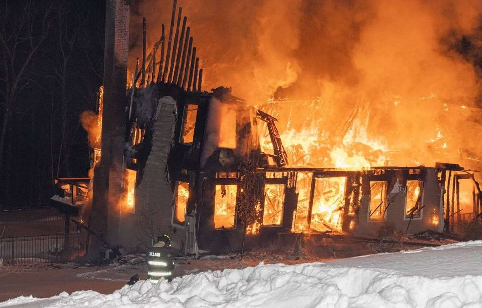 Stricken man dies after being found outside Tolland house fire