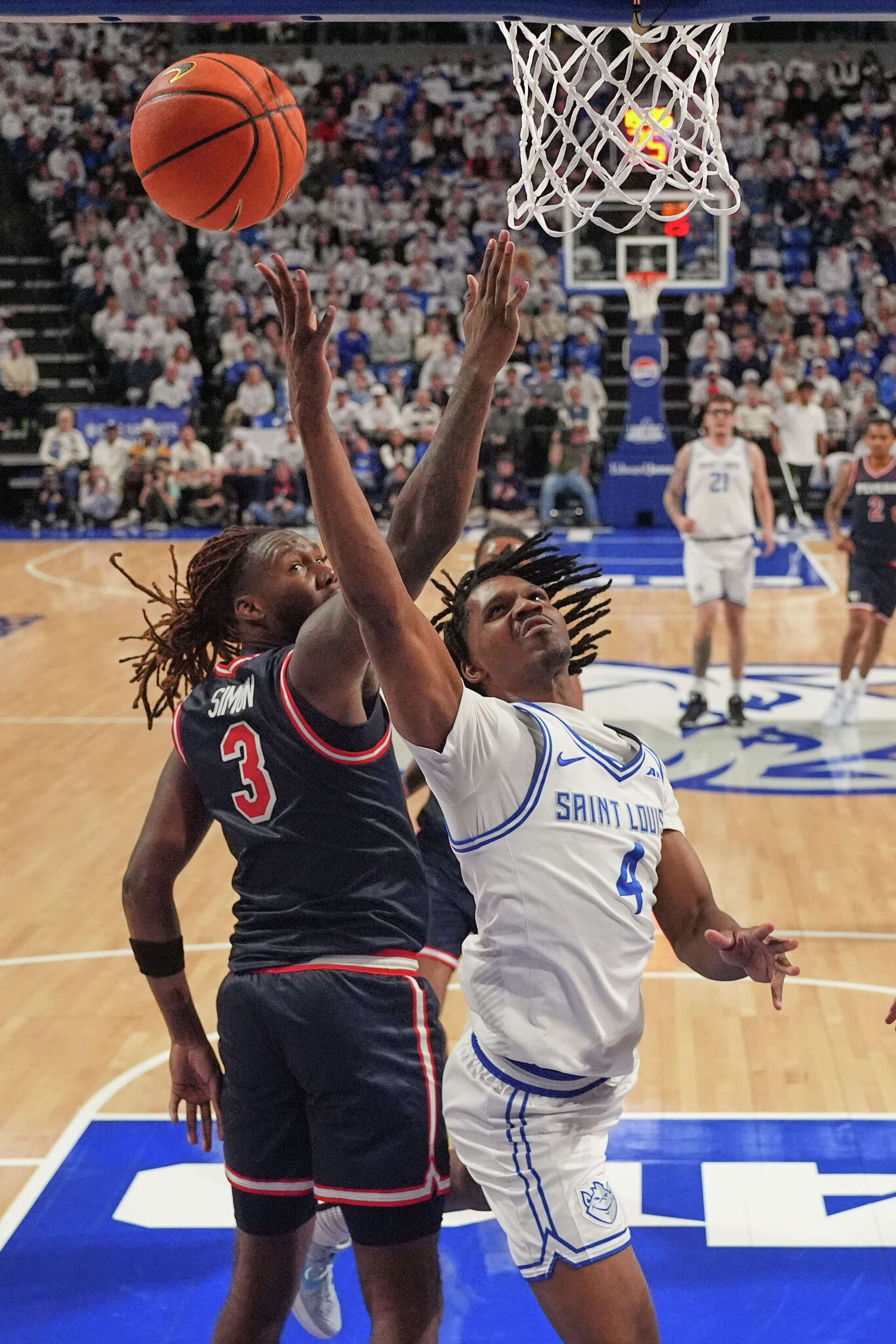 Billikens coach Josh Schertz shares shots at St. Louis bar after win