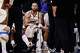 Guard Warriors Stephen Curry berlutut di bangku cadangan pada pertandingan terakhir yang dia mainkan, melawan Detroit Pistons di Chase Center pada 30 Januari.