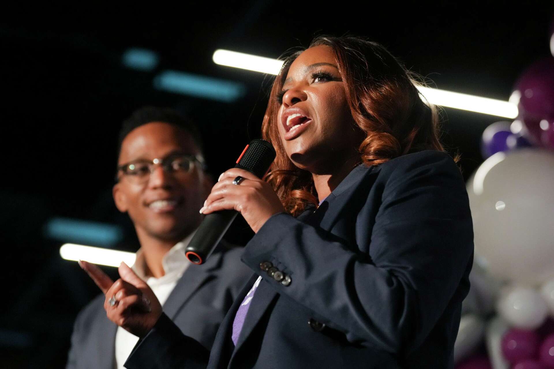 Congresswoman Jasmine Crockett speaks alongside Christian Menefee after he defeated Amanda Edwards to win the 18th Congressional District in Houston, Saturday, 