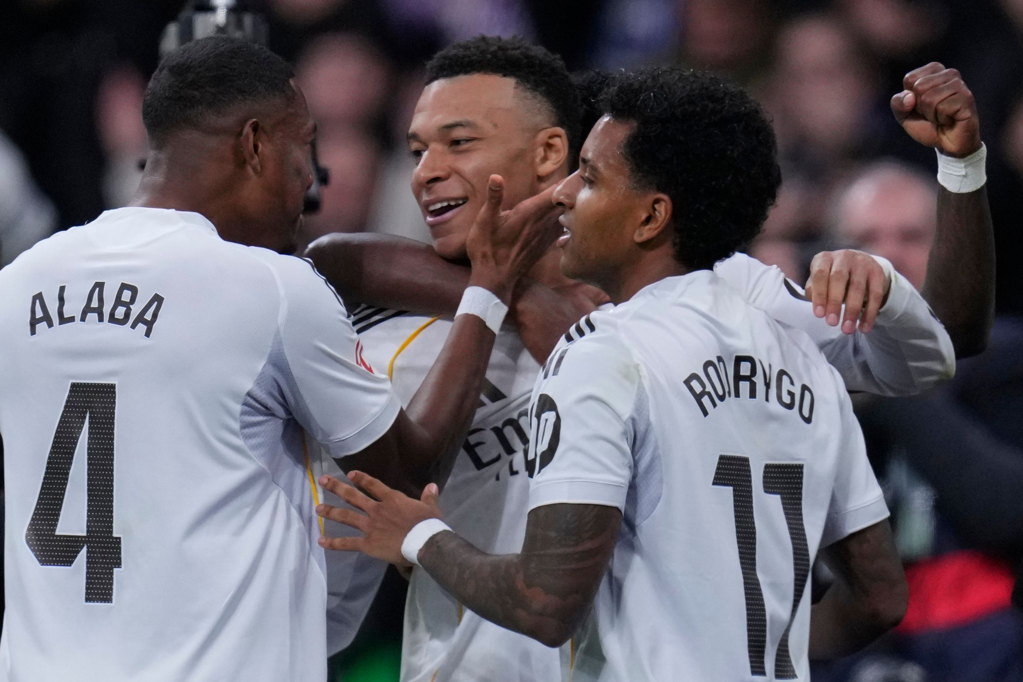 Mbappé's last-gasp penalty lifts Real Madrid to 2-1 win over Rayo ...