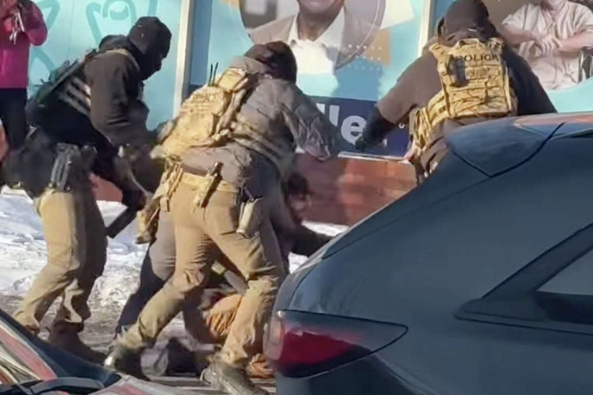 A screenshot from a video shows the moments before Alex Pretti was shot by federal immigration agents in Minneapolis on Jan. 24.