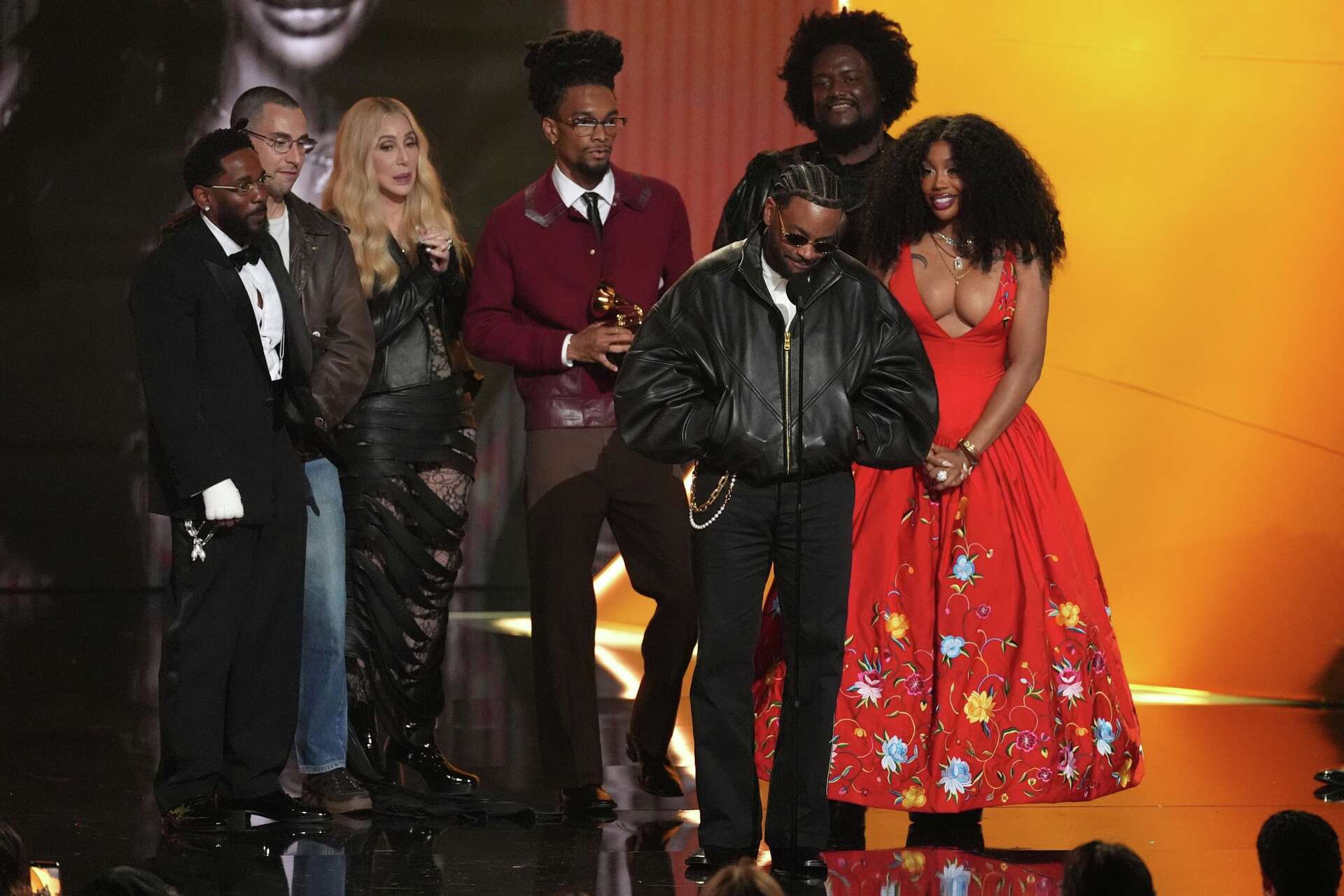 A smiling Cher laughs at her Grammys flubs in a good-natured