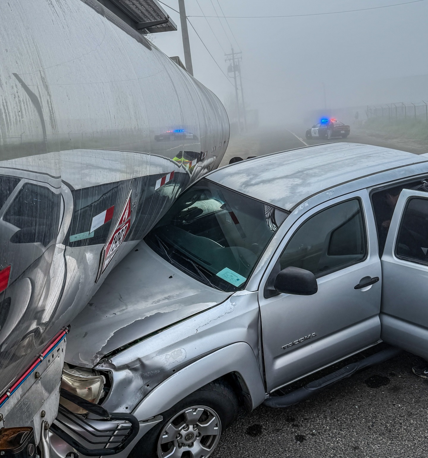 Photos show driver's escape after collision with semitruck