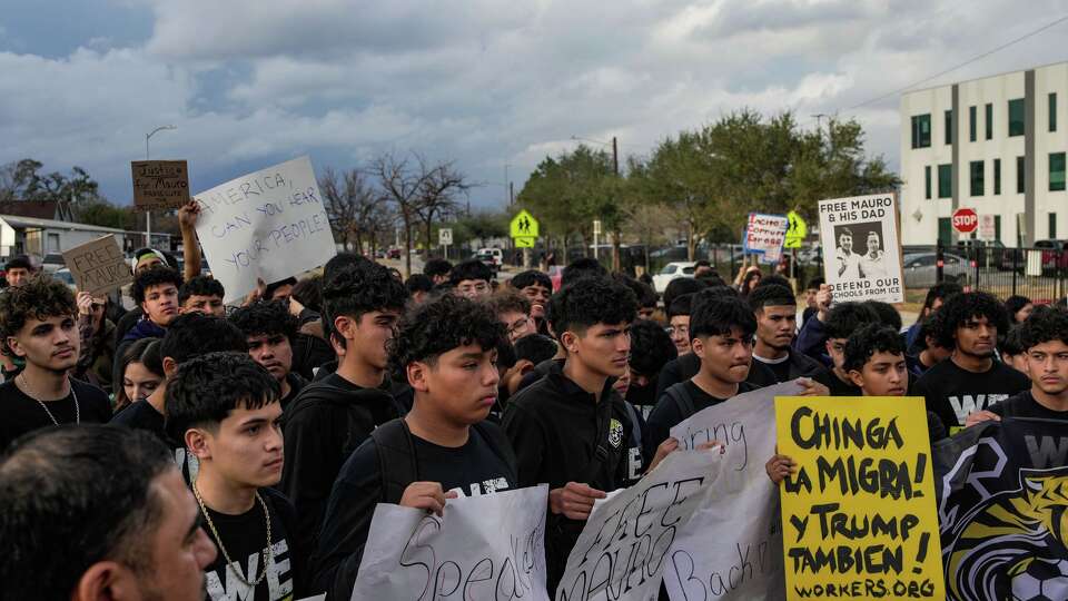 Students protest outside Sam Houston Math, Science and Technology Center High School in support of Mauro Henriquez, a fellow student detained along with his father by U.S. Immigration and Customs Enforcement, calling for his release so he can return home and graduate with his class in Houston, Tuesday, Feb. 3, 2026.