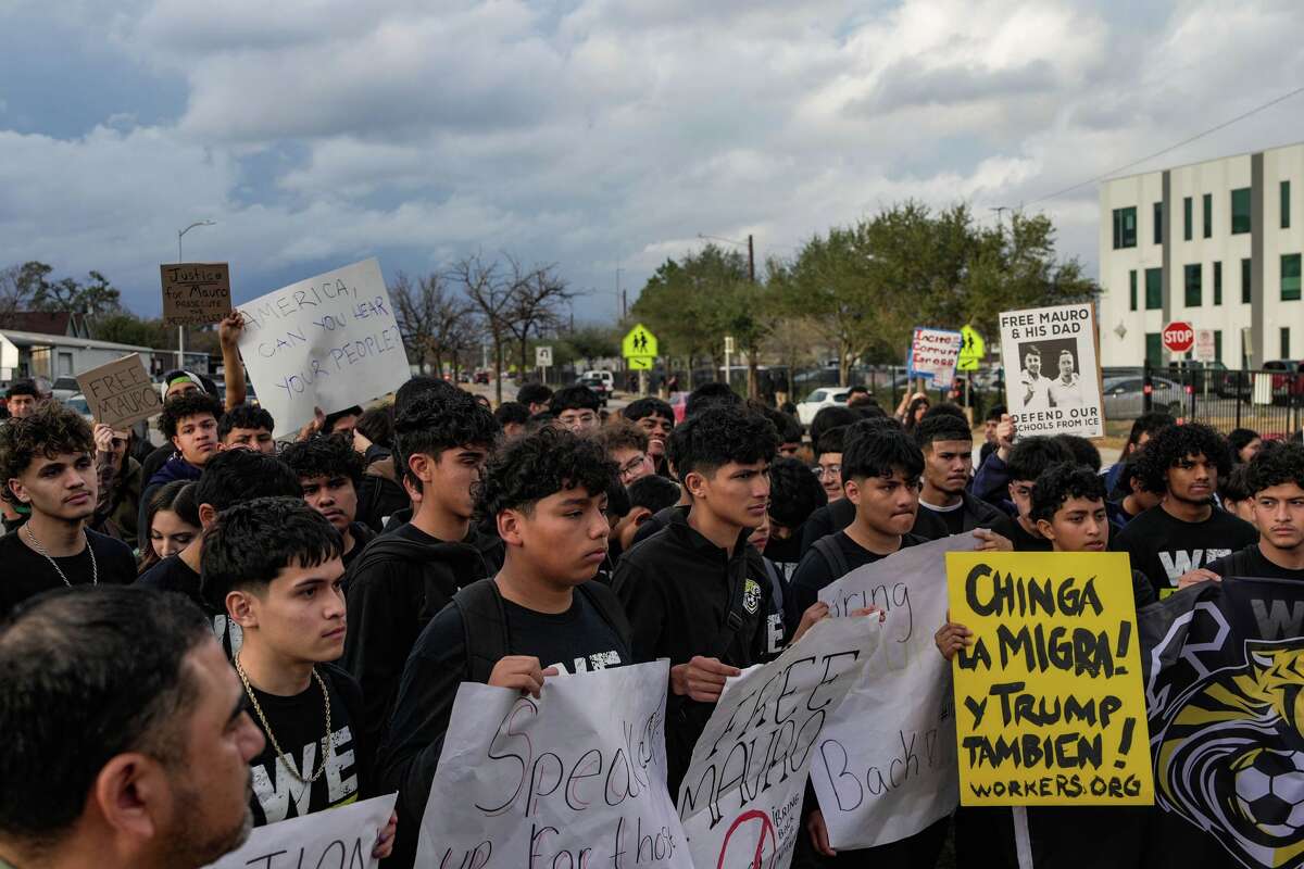 Students protest outside Sam Houston Math, Science and Technology Center High School in support of Mauro Henriquez, a fellow student detained along with his father by U.S. Immigration and Customs Enforcement, calling for his release so he can return home and graduate with his class in Houston, Tuesday, Feb. 3, 2026.