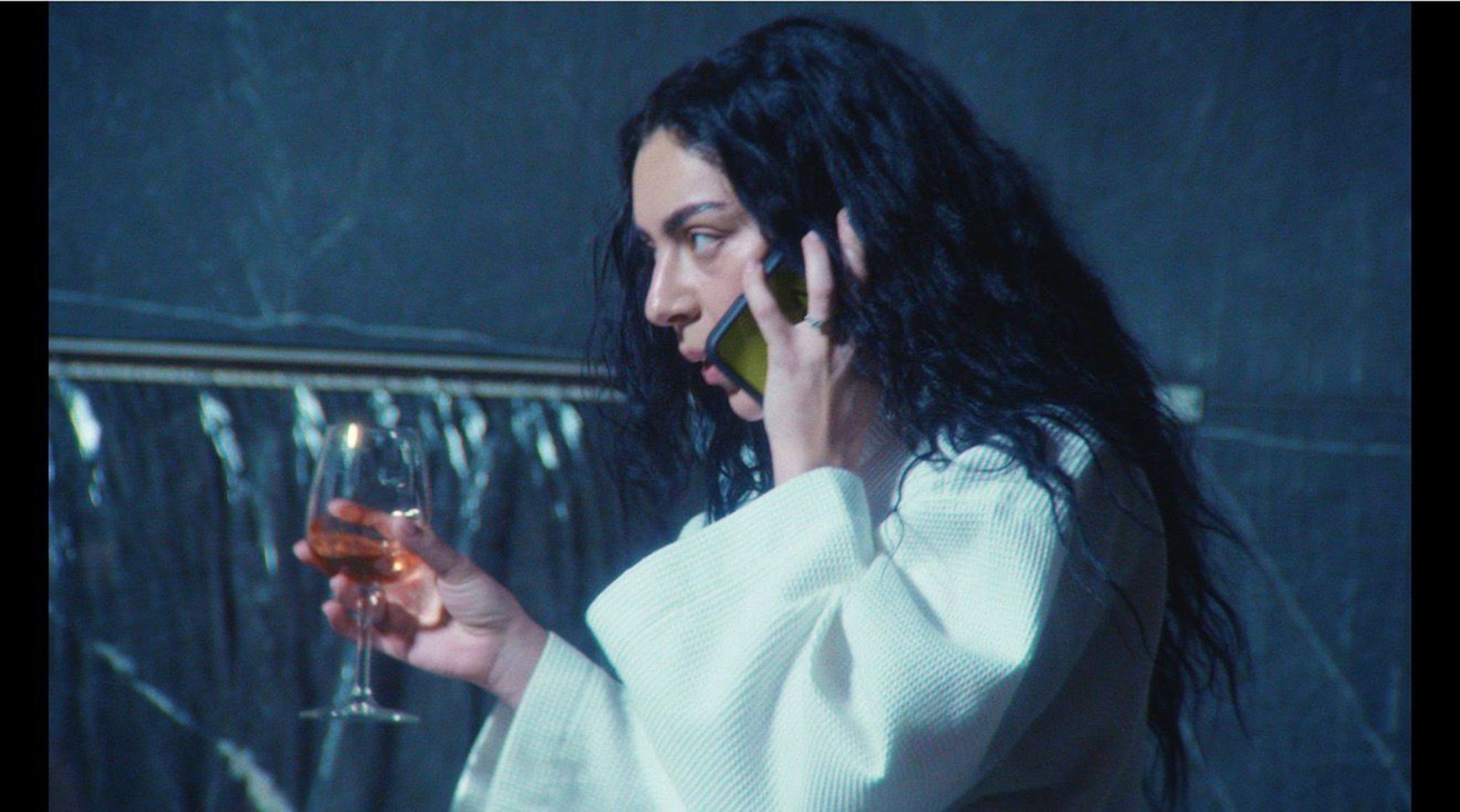 How Charli xcx's 'The Moment' skewers fame to keep 'brat' alive