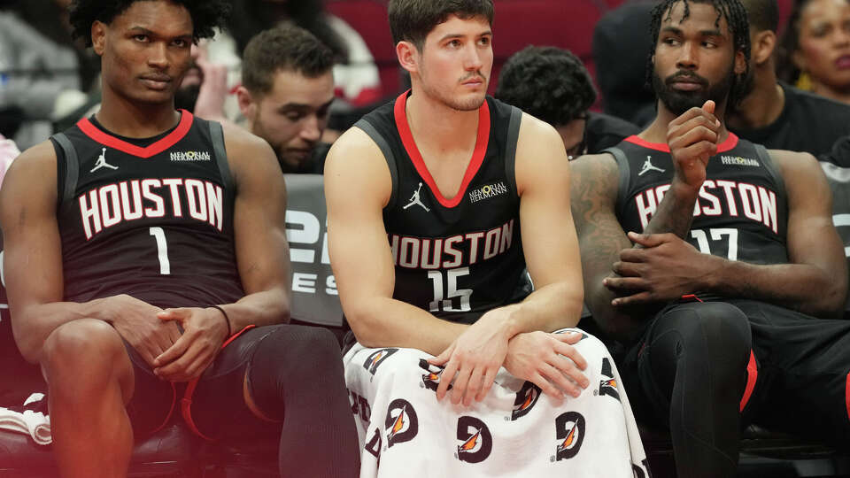 Houston Rockets Amen Thompson (1), Reed Sheppard (15) and Tari Eason (17) react to the final minutes of game time against the Boston Celtics at the Toyota Center in Houston on Wednesday, Feb. 4, 2026. Boston Celtics defeated the Houston Rockets 114-93.