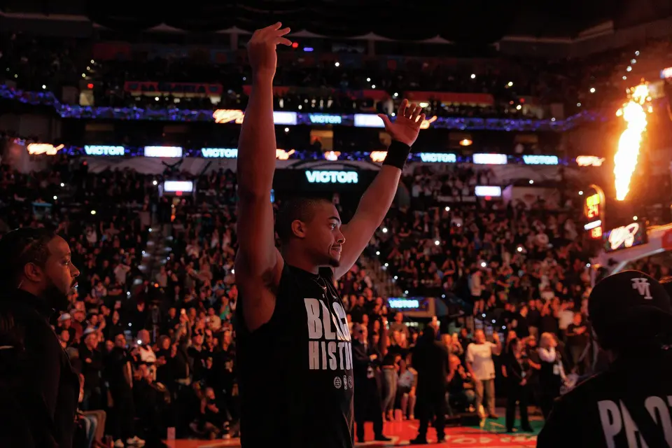 San Antonio Spurs forward Keldon Johnson (3) gestures for the crowd to continue cheering as the starting line up is announced before the game against the Oklahoma City Thunder at Frost Bank Center in San Antonio, Wednesday, Feb. 4, 2026.