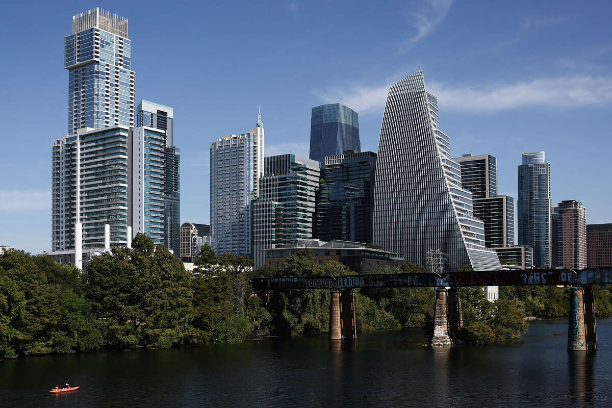 A view of the downtown buildings and the Lady Bird Like in Austin, United States on October 20, 2025. (Photo by Jakub Porzycki/NurPhoto via Getty Images)