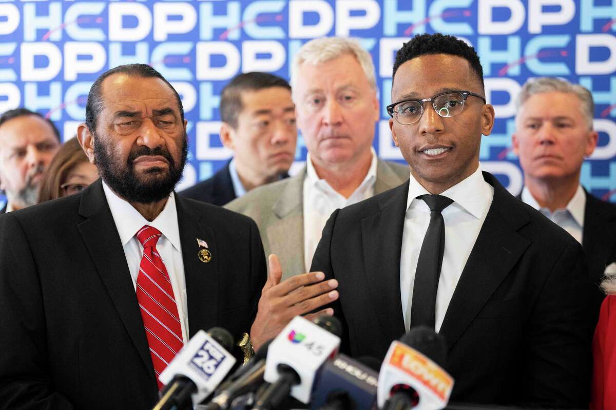 Congressman Christian Menefee speaks alongside follow Congressman Al Green as lawmakers announced the filing of a lawsuit seeking to stop ICE from unlawfully detaining and abusing American citizens during their recent operations across the greater Houston area, Friday, Feb. 6, 2026, in Houston.