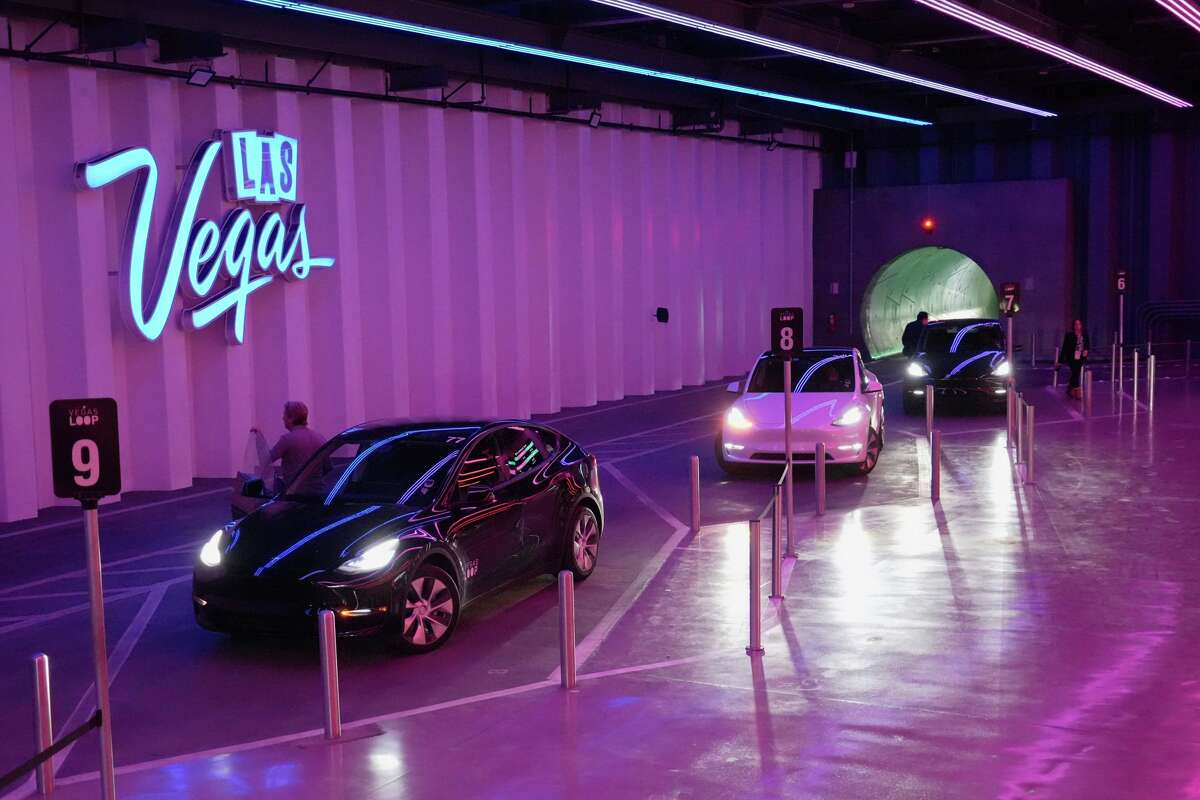 Teslas are lined up inside the Vegas Loop Wednesday, Feb. 4, 2026, in Las Vegas.