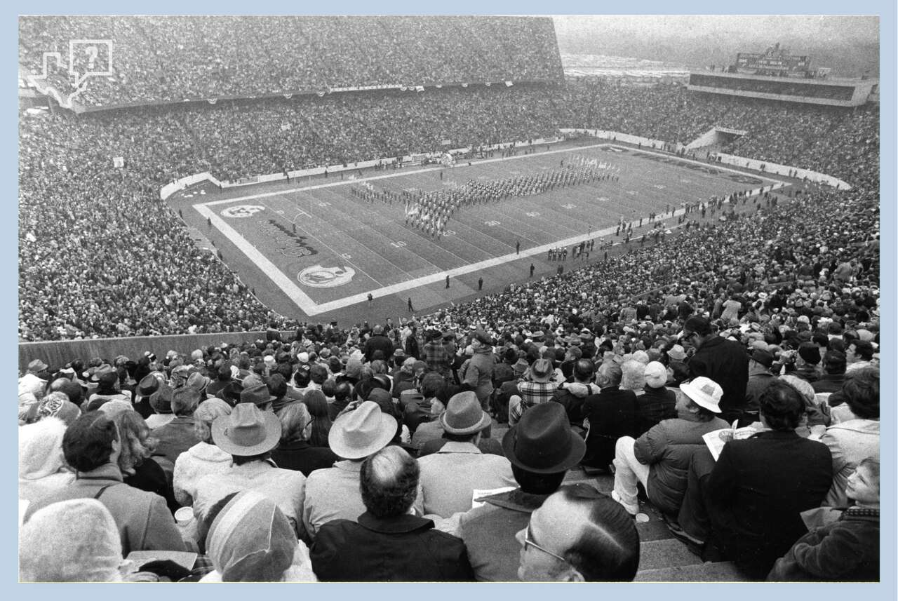  Fans in the stands watch Super Bowl VIII game between the Minnesota Vikings and the Miami Dolphins, Jan. 13, 1974, at Rice Stadium in Houston.