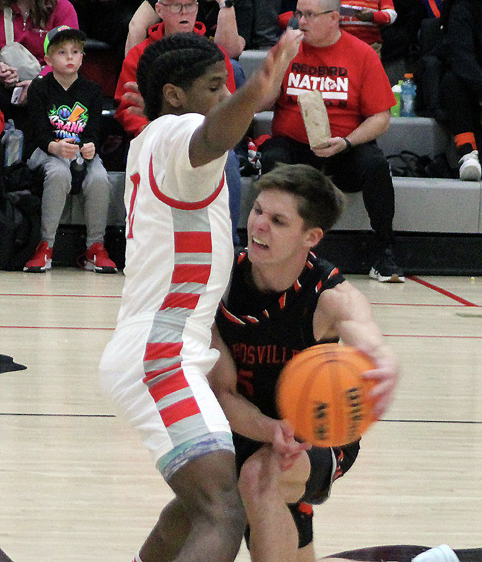 Edwardsville boys basketball travels to Alton for conference action