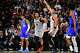 San Antonio Spurs guard Stephon Castle (5) celebrates after a three-point-shot during the second quarter of an NBA basketball game against the Dallas Mavericks, Saturday, Feb. 7, 2026, in San Antonio.