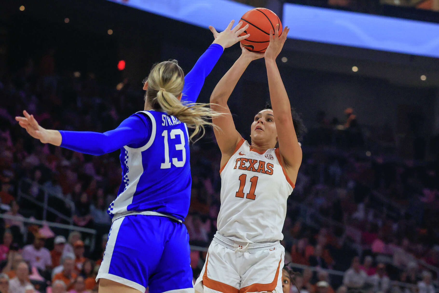 Seven Lakes alumnus Justice Carlton bailed out the Longhorns on a rough offensive night Monday as they found a way to beat Kentucky despite being far from their best.