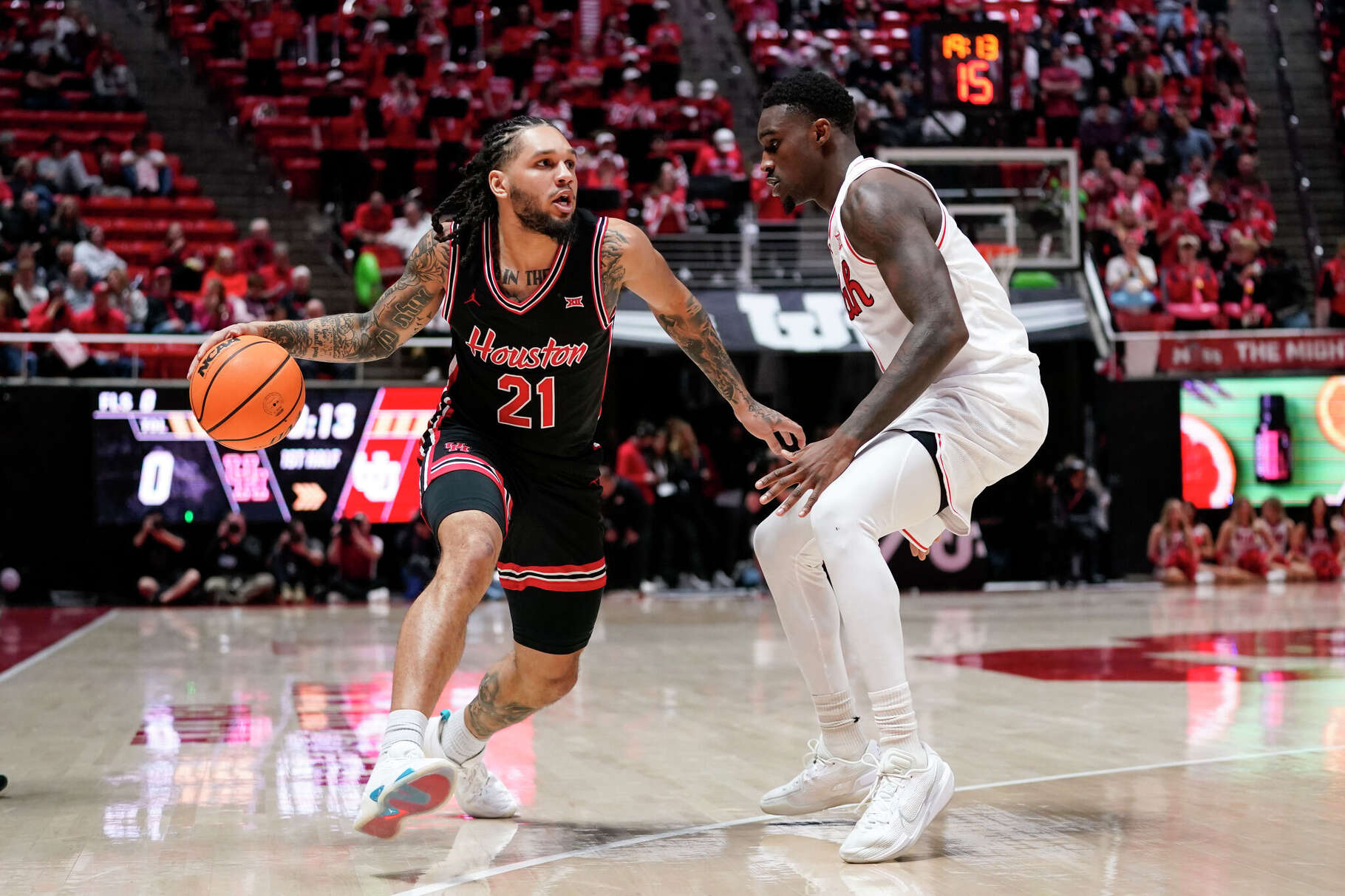 Emanuel Sharp became the Cougars' all-time leader in 3-pointers as UH rolled past Utah to move into a first-place tie in the Big 12.