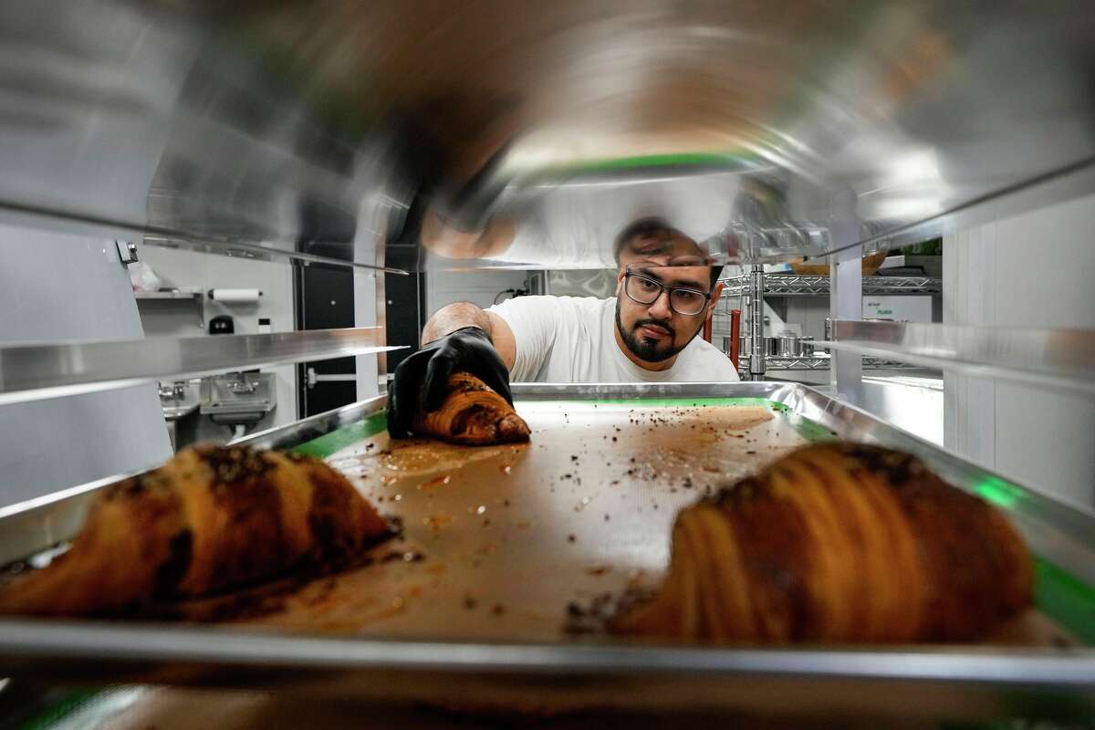 Efrain Ayllon sorts pasties in the kitchen at Yemex Bakehouse & Specialty Coffee, a new Mexican-Yemeni cafe, opening in Houston, Wednesday, Feb. 11, 2026.