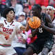 Texas Tech guard Christian Anderson, left, rips the ball away from Colorado forward Bangot Dak (8) during the first half of an NCAA college basketball game, Wednesday, Feb. 11, 2026, in Lubbock, Texas. (AP Photo/Chase Seabolt)