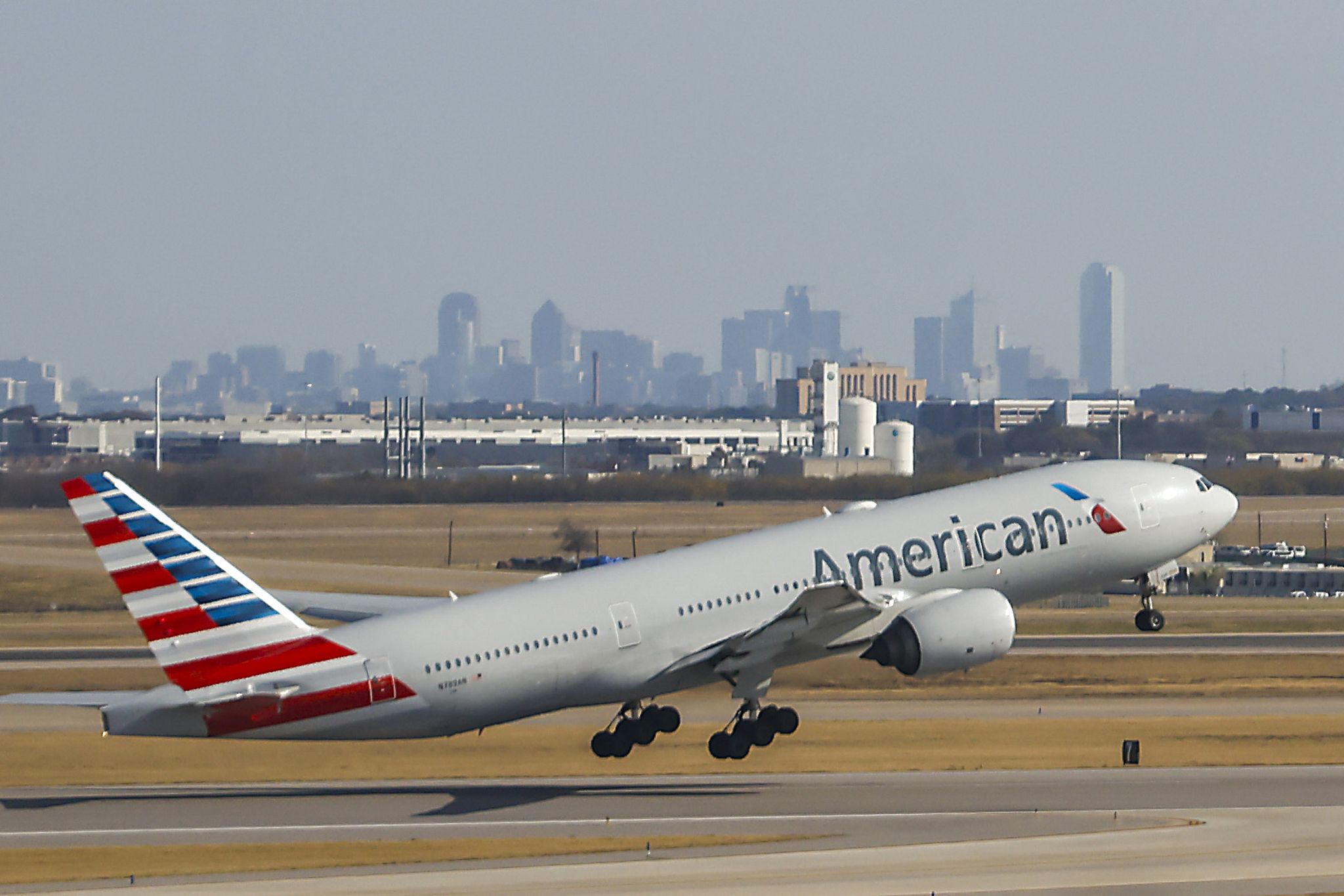 American Airlines ends some free business-class upgrades