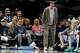 Dallas Mavericks minority owner Mark Cuban, second from left, and Dallas Mavericks forward Cooper Flagg, standing, smile during the first half of an NBA basketball game against the Utah Jazz at American Airlines Center, Thursday, Jan. 15, 2026, in Dallas.