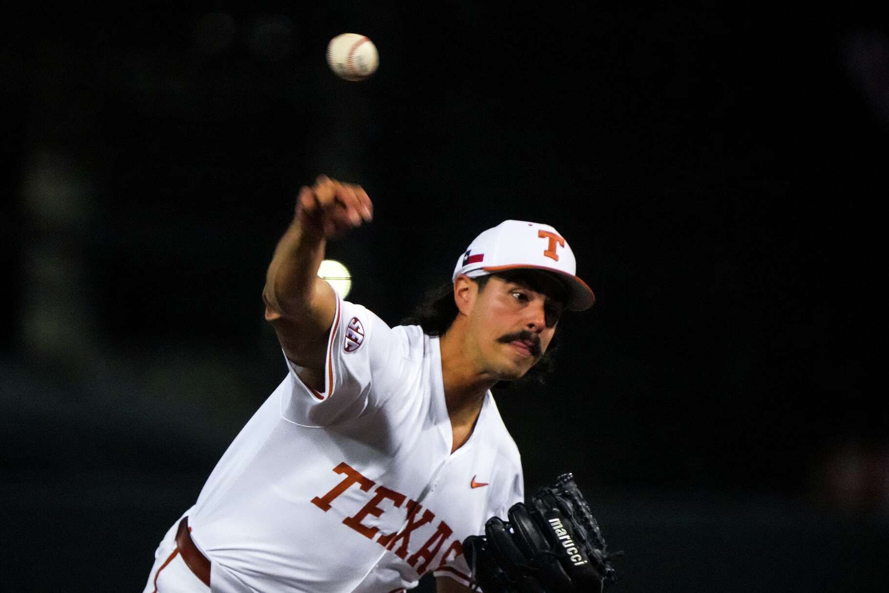Texas Longhorns pitcher Ruger Riojas (13) throws a pitch during the game against UC Davis at UFCU Disch-Falk Field on Friday, Feb. 13, 2026 in Austin.