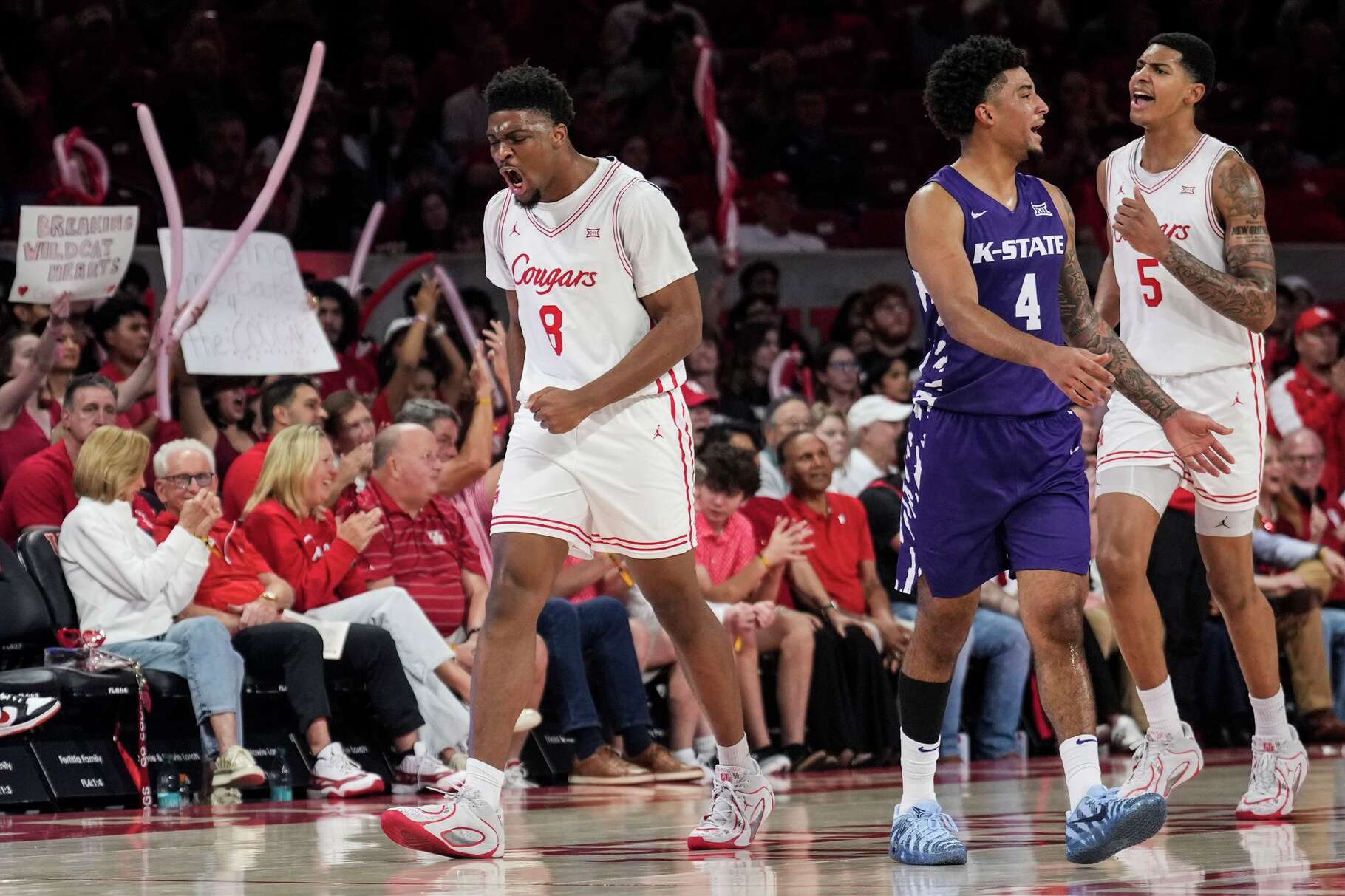 Houston center Cedric Lath (8) reacts are forcing a Kansas State turnover during the first half of an NCAA college basketball game at Fertitta Center in Houston, Saturday, Feb. 14, 2026.