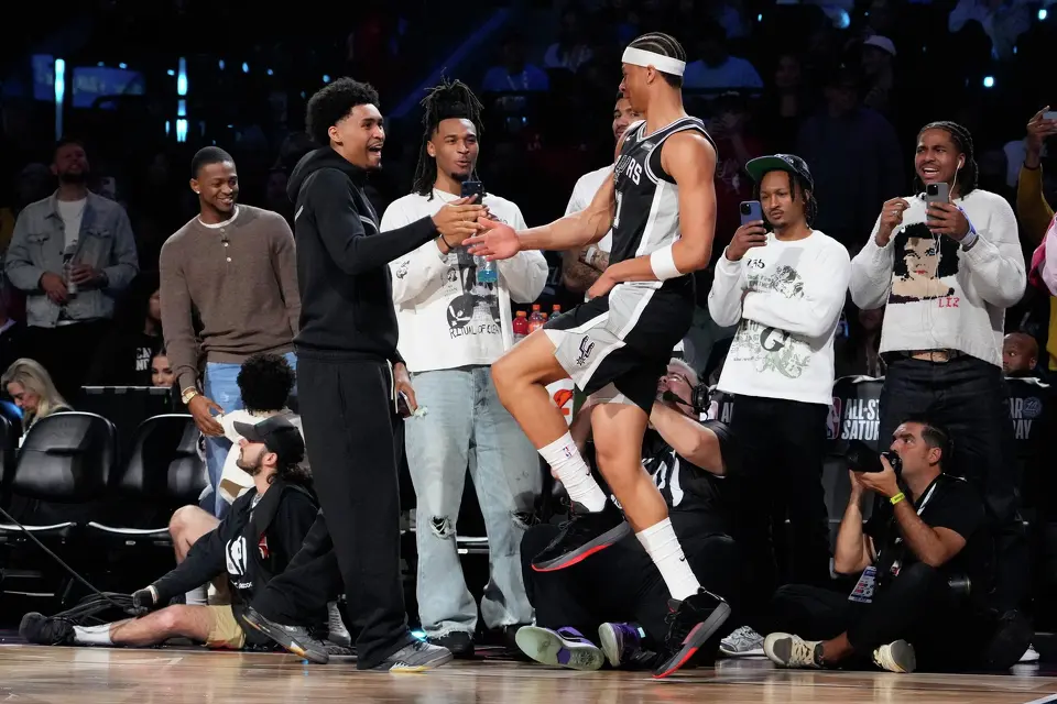 San Antonio Spurs forward Carter Bryant celebrates after dunking during the slam dunk contest at the NBA basketball All-Star weekend festivities Saturday, Feb. 14, 2026, in Inglewood, Calif. (AP Photo/Mark J. Terrill)