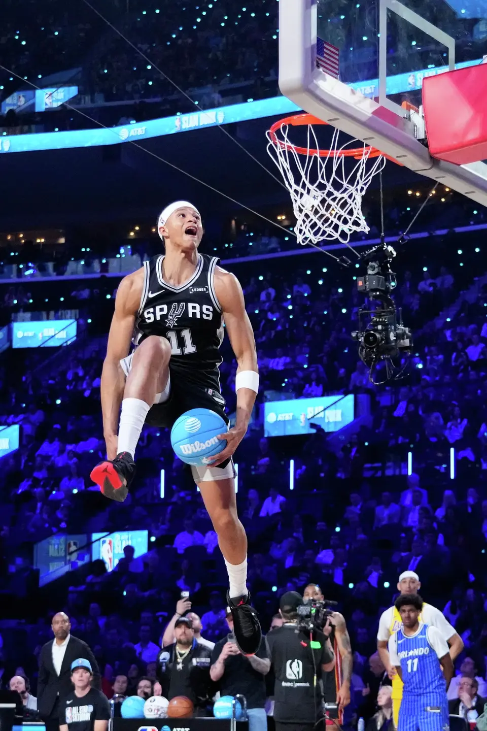 San Antonio Spurs forward Carter Bryant dunks during the slam dunk contest at the NBA basketball All-Star weekend festivities Saturday, Feb. 14, 2026, in Inglewood, Calif. (AP Photo/Mark J. Terrill)