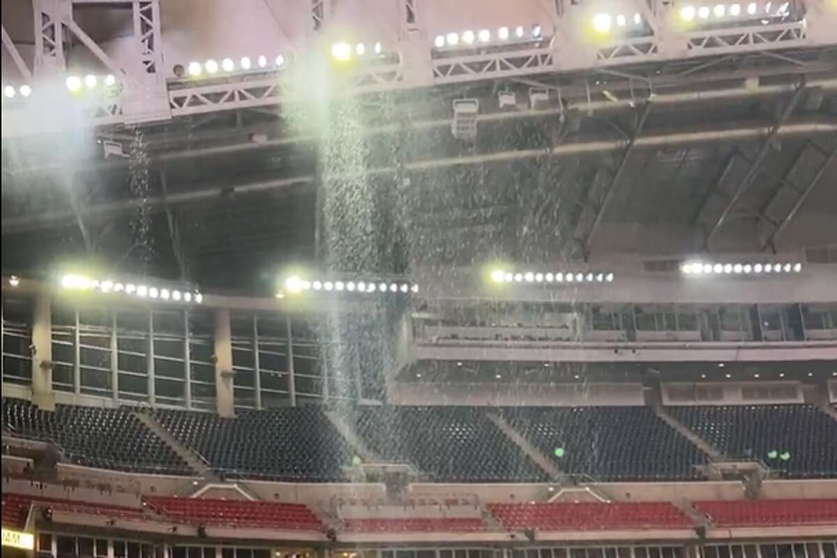 Rain pours onto the ground at NRG Stadium in Houston, Texas, on Feb. 14, 2026.