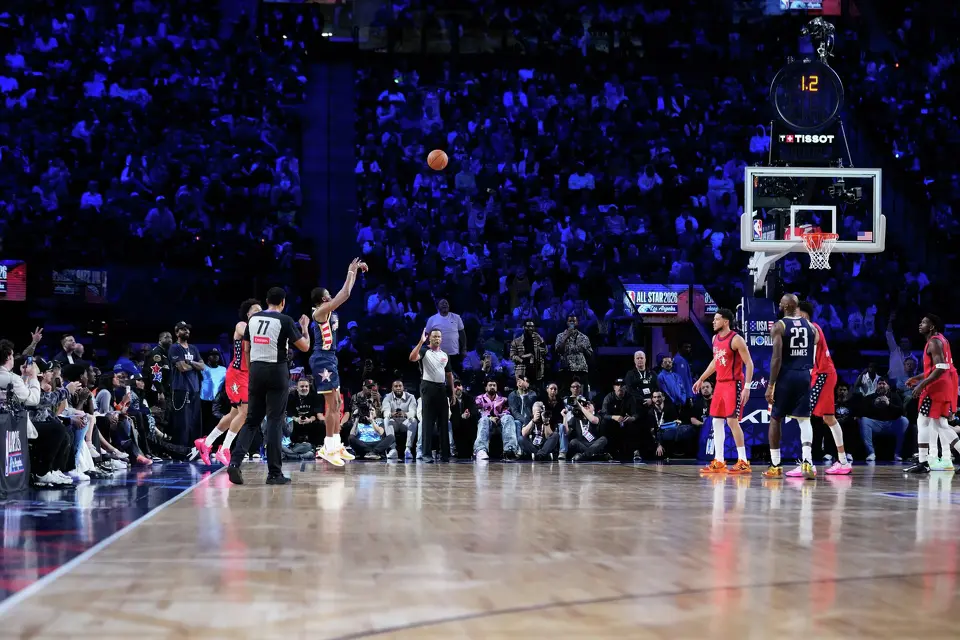 USA Stripes guard De'Aaron Fox makes a basket at the buzzer to beat USA Stars during the NBA All-Star basketball game Sunday, Feb. 15, 2026, in Inglewood, Calif. (AP Photo/Mark J. Terrill)