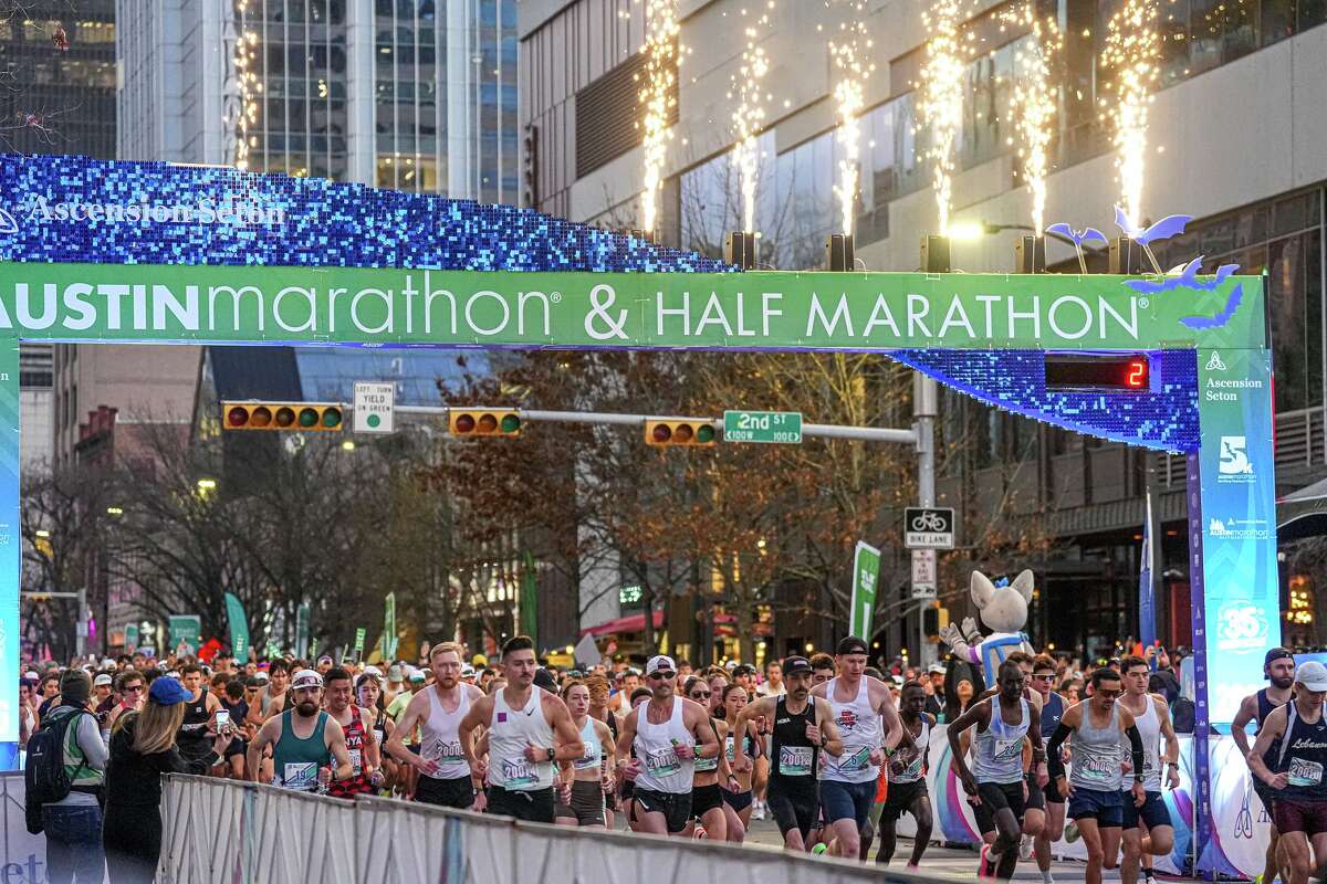 Runners leave the starting line at the start of the Austin Marathon on Sunday, Feb. 15, 2026 in Austin.