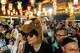 Seorang jamaah mengenakan topi kuda di Kuil Wong Tai Sin untuk menyambut Tahun Baru Imlek Kuda di Hong Kong, Senin, 16 Februari 2026. (AP Photo/Chan Long Hei)