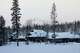 Roofs and mountains are covered in snow in Truckee.