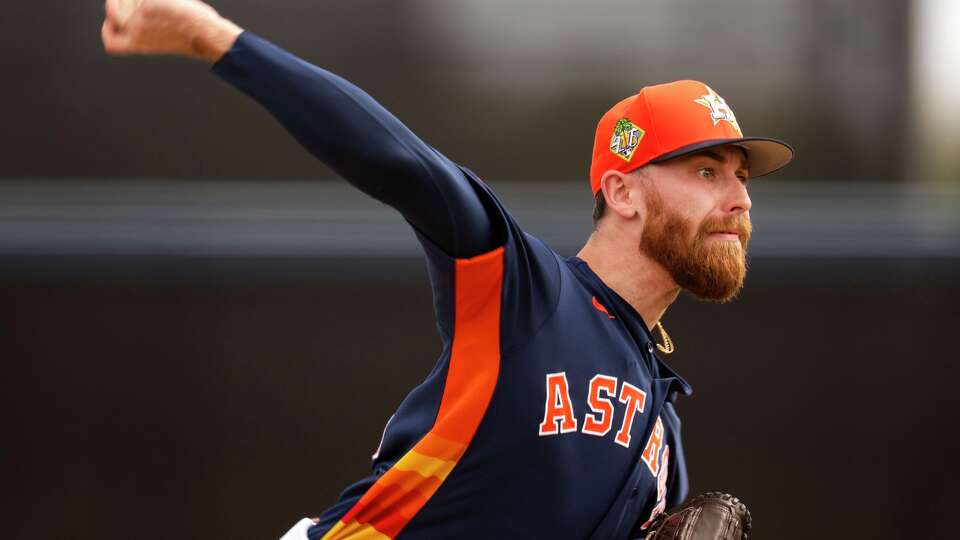 Houston Astros pitcher Mike Burrows (50) delivers during Spring Training at CACTI Park of the Palm Beaches in West Palm Beach, Tuesday, Feb. 17, 2026.
