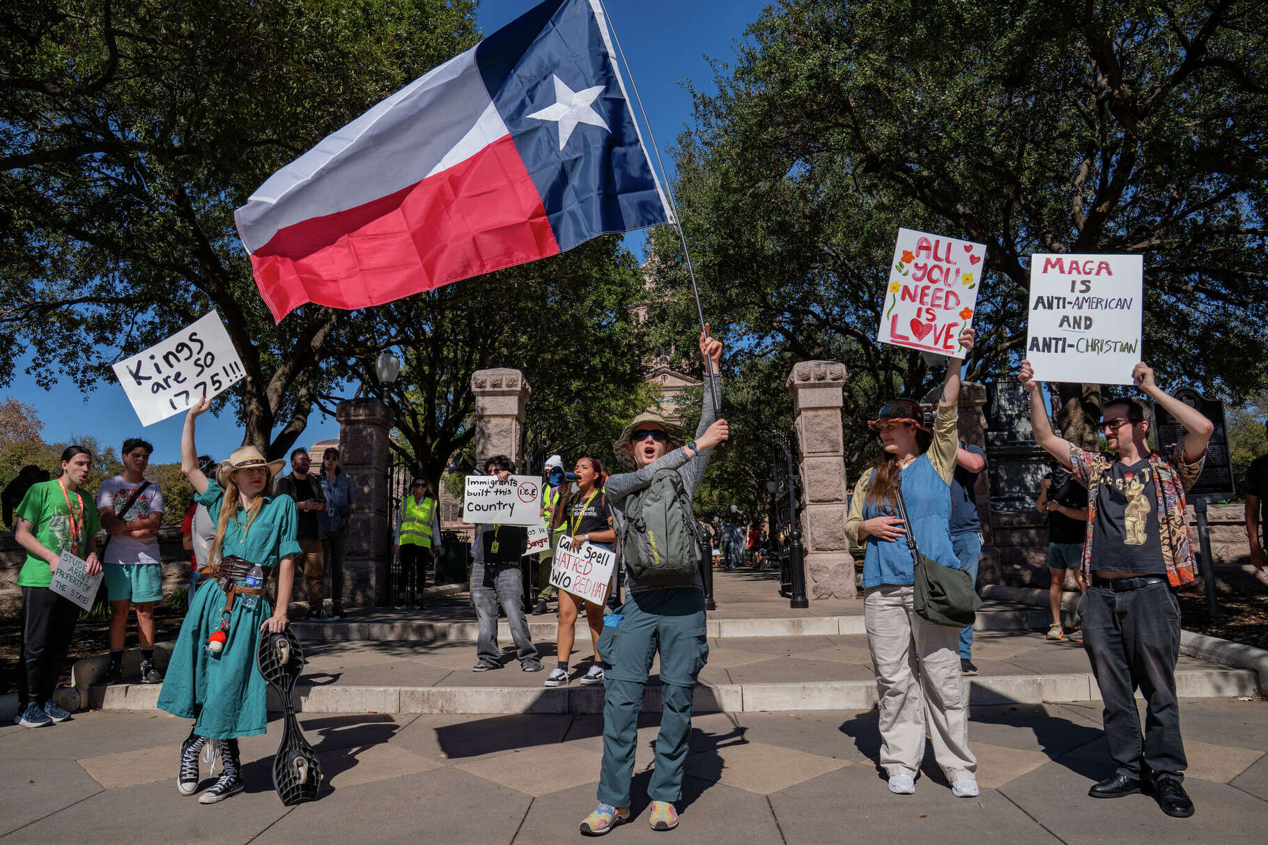 Central Texas high school students and community members protest ICE outside the Texas Capitol in Austin Monday, Feb. 16, 2026.