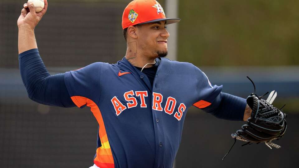 Houston Astros pitcher Bryan Abreu (52) delivers during a live batting session in Spring Training at CACTI Park of the Palm Beaches in West Palm Beach, Thursday, Feb. 19, 2026.