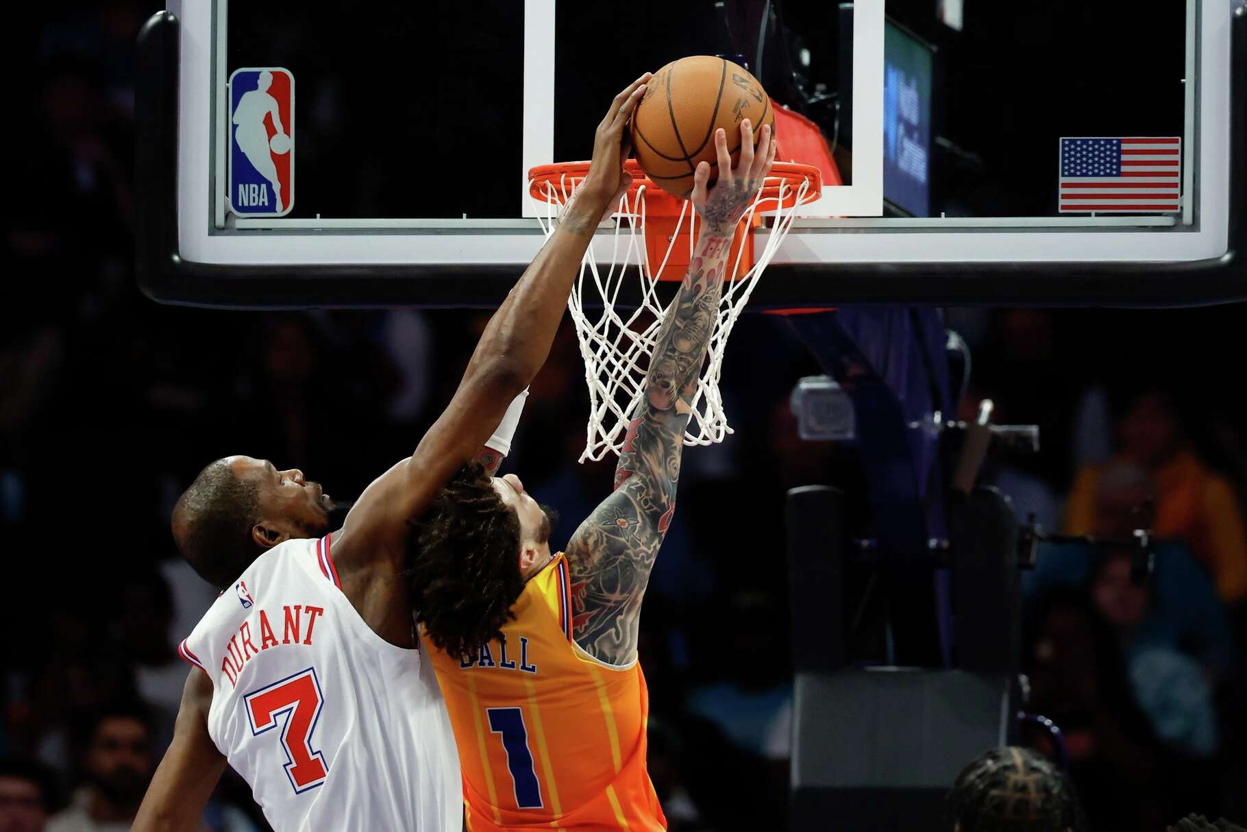 Houston Rockets forward Kevin Durant (7) blocks a shot attempt by Charlotte Hornets guard LaMelo Ball during the first half of an NBA basketball game in Charlotte, N.C., Thursday, Feb. 19, 2026. (AP Photo/Nell Redmond)