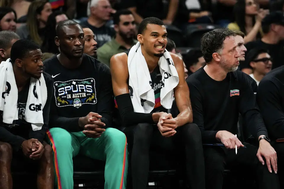 San Antonio Spurs forward Victor Wembanyama (1) sits on the bench in the first quarter as the Spurs take on the Suns on Thursday night, Feb. 19, 2026 in the first of two “I-35 Series” games in Austin at the Moody Center.