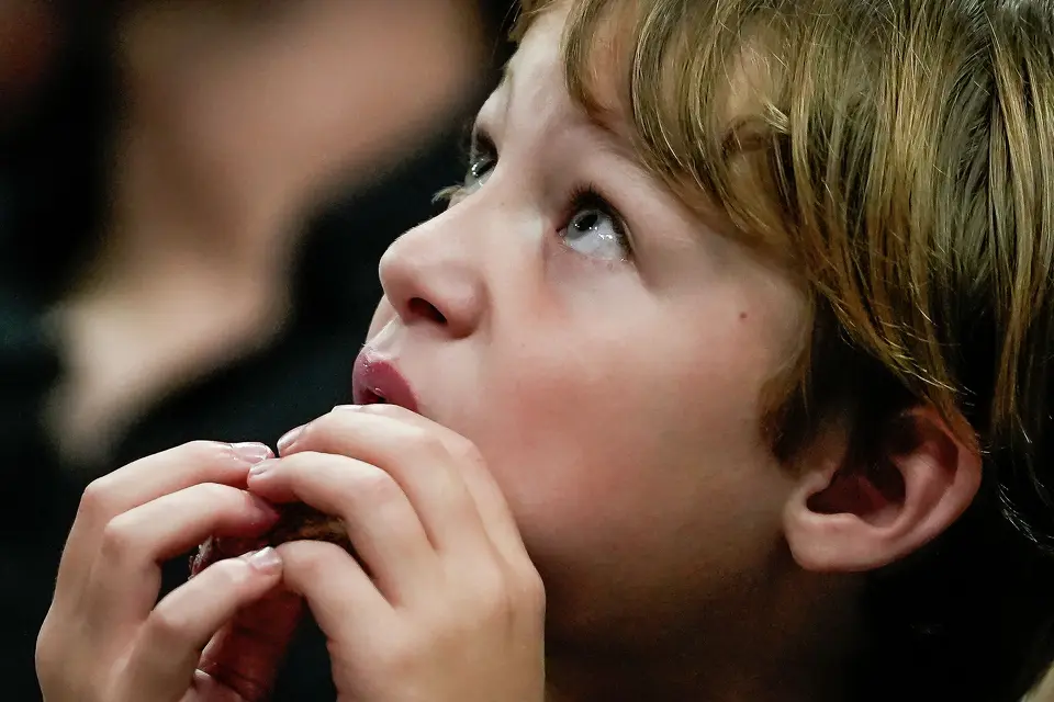 A young fan watches a replay on the jumbotron in the second quarter as the Spurs take on the Suns on Thursday night, Feb. 19, 2026 in the first of two “I-35 Series” games in Austin at the Moody Center.
