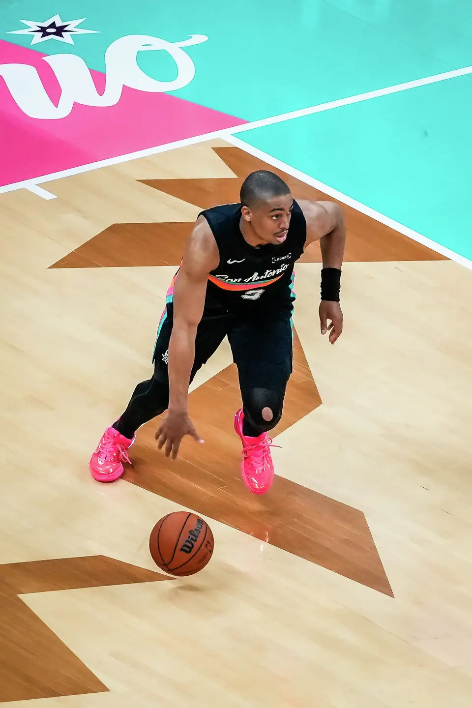 San Antonio Spurs guard Keldon Johnson (3) dribbles the ball in the third quarter as the Spurs take on the Suns on Thursday night, Feb. 19, 2026 in the first of two “I-35 Series” games in Austin at the Moody Center. The Spurs won the game 121-94.